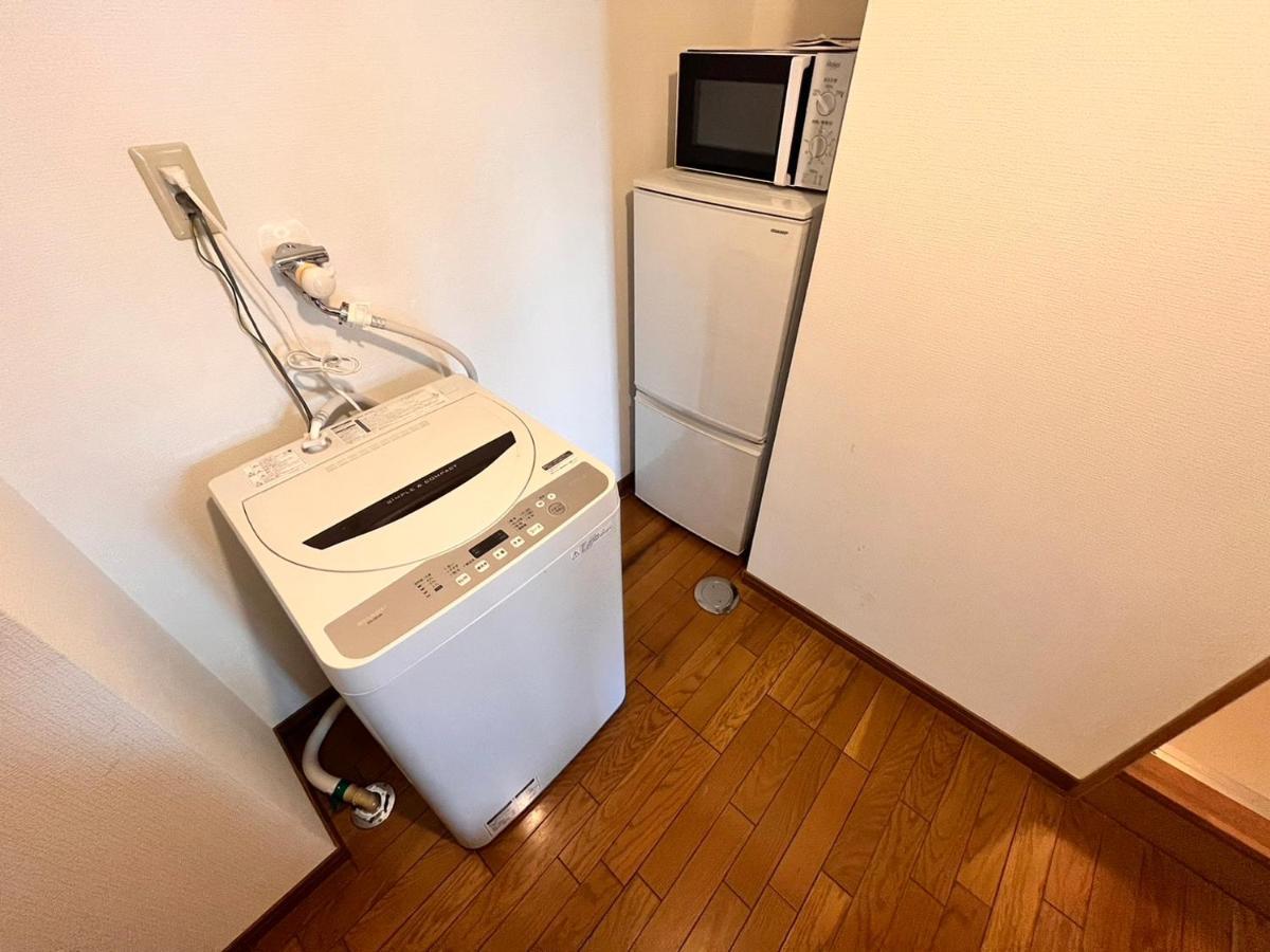 東横のヨコ Apartamento Okayama Exterior foto
