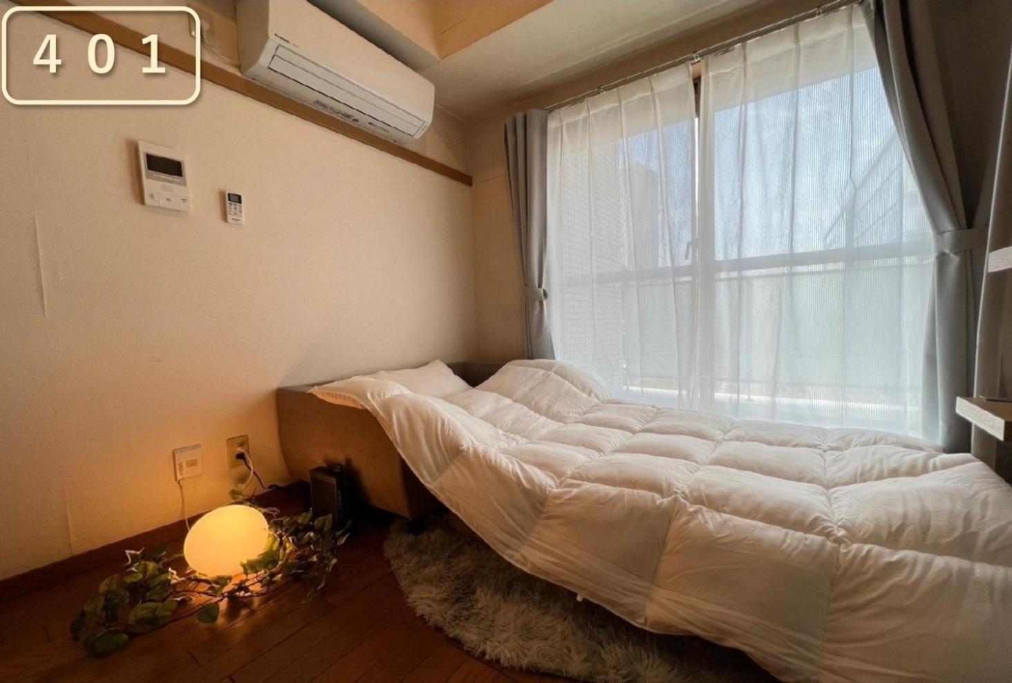 東横のヨコ Apartamento Okayama Exterior foto