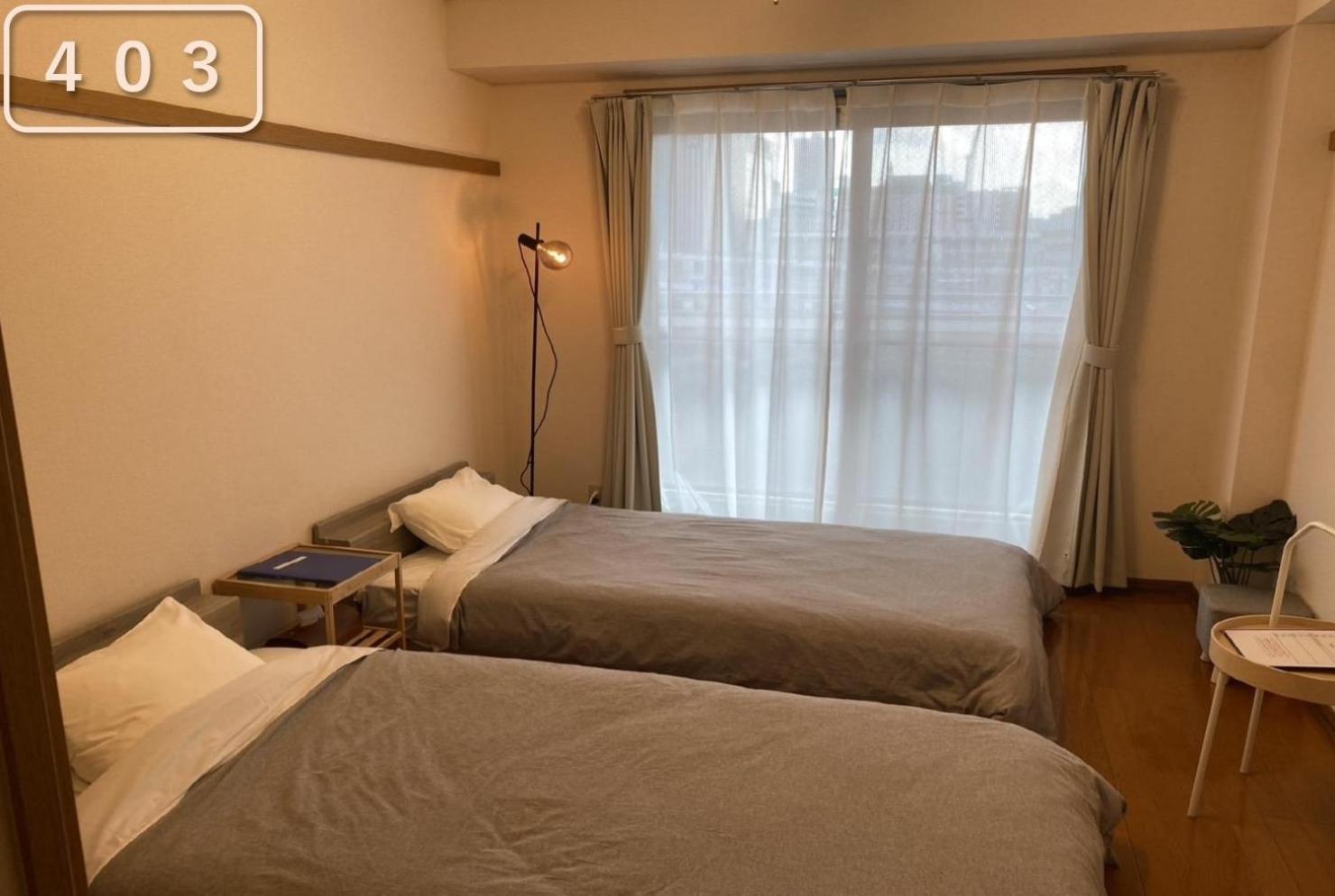 東横のヨコ Apartamento Okayama Exterior foto